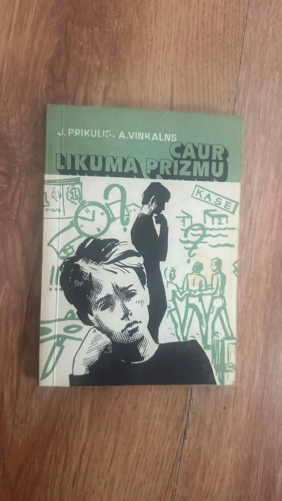 Detektīvgrāmata "Caur likuma prizmu"