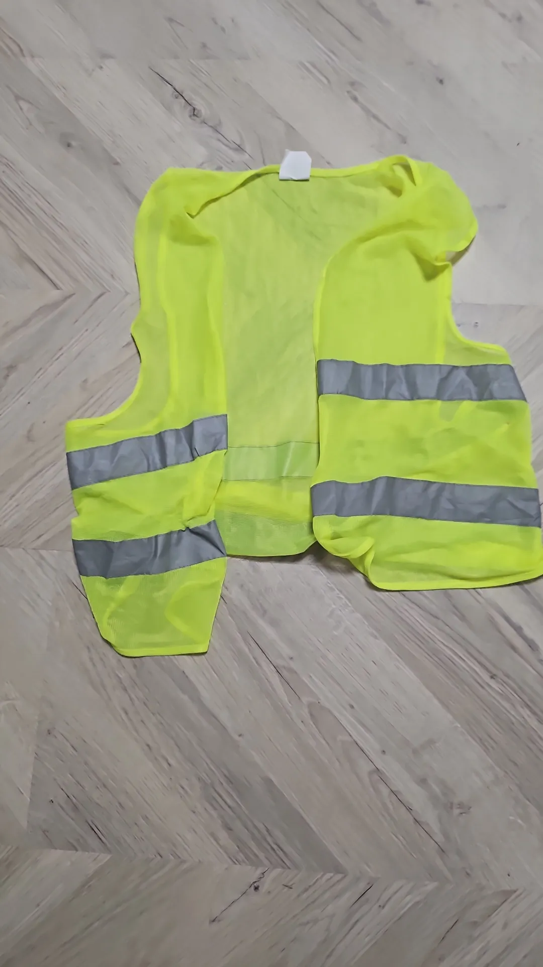 Luminiscējošs drošības vestis ar atstarojošām joslām