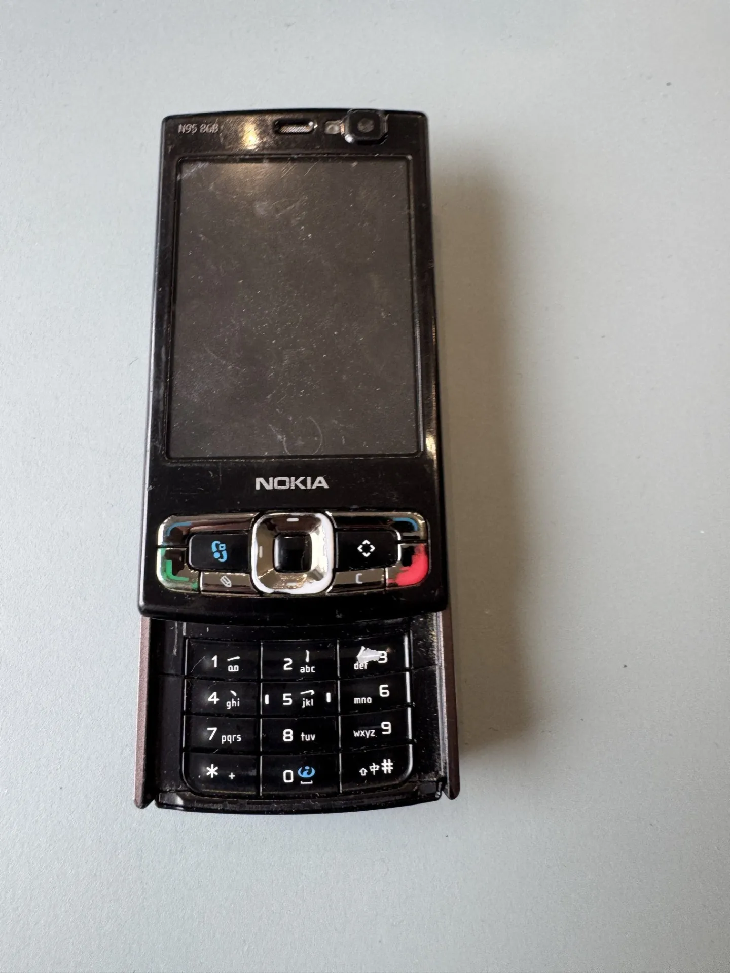 Nokia N95 slīdošais viedtālrunis (brūns/plūmju)